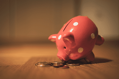 DevOps Piggy Bank Looking At Coins